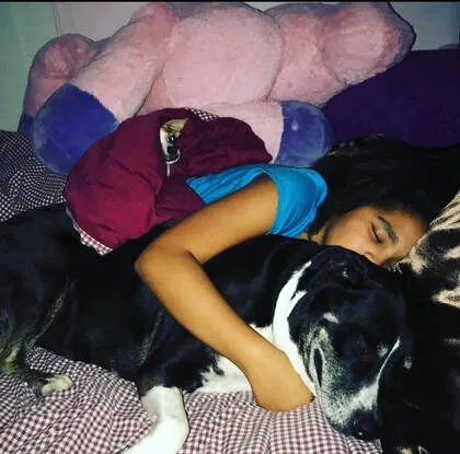 A girl napping with Lucy